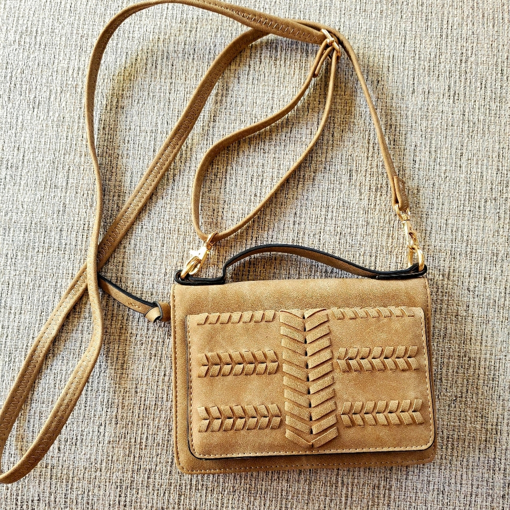 Small clutch with strap from the buckle brown boho